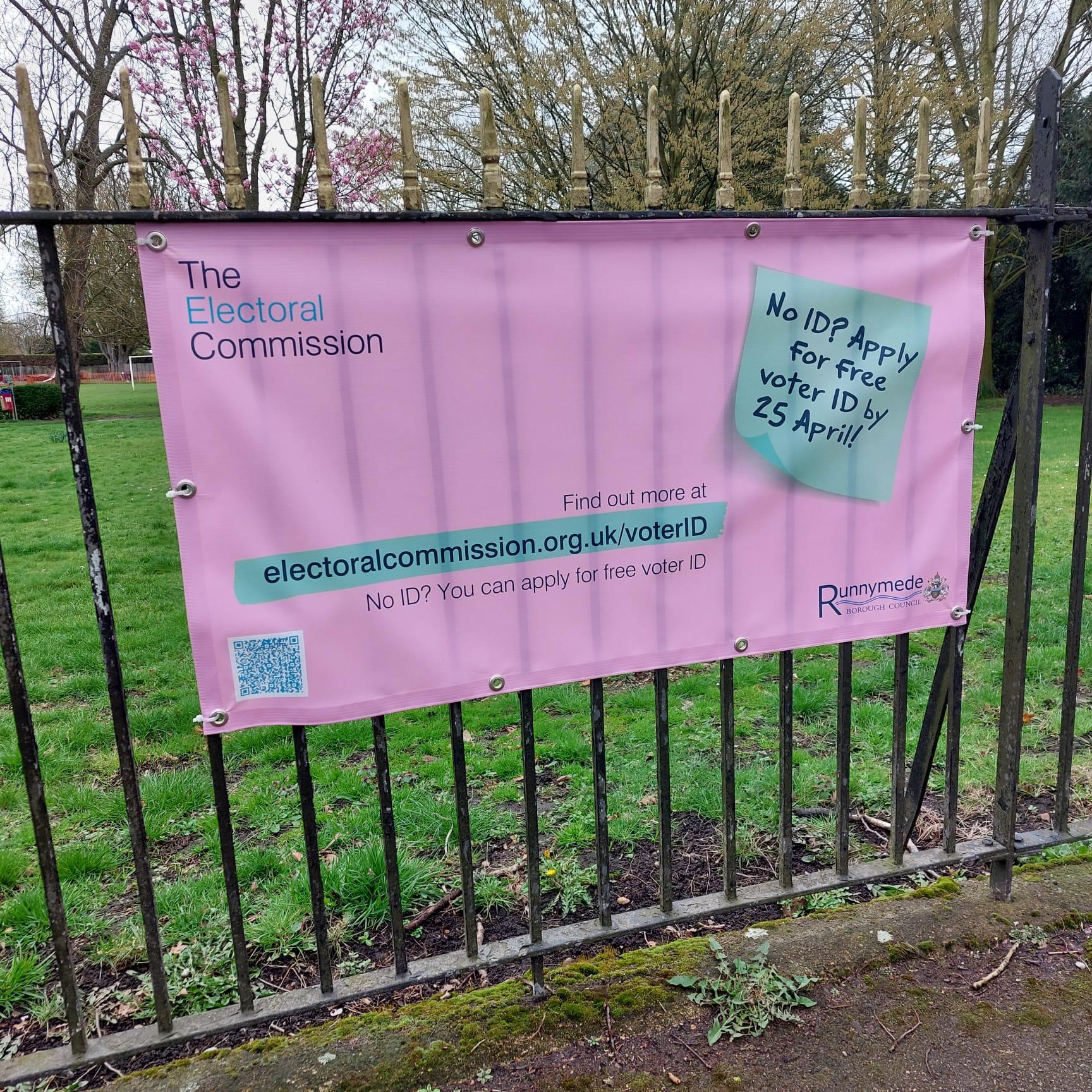 banner on railings advertising voter ID changes