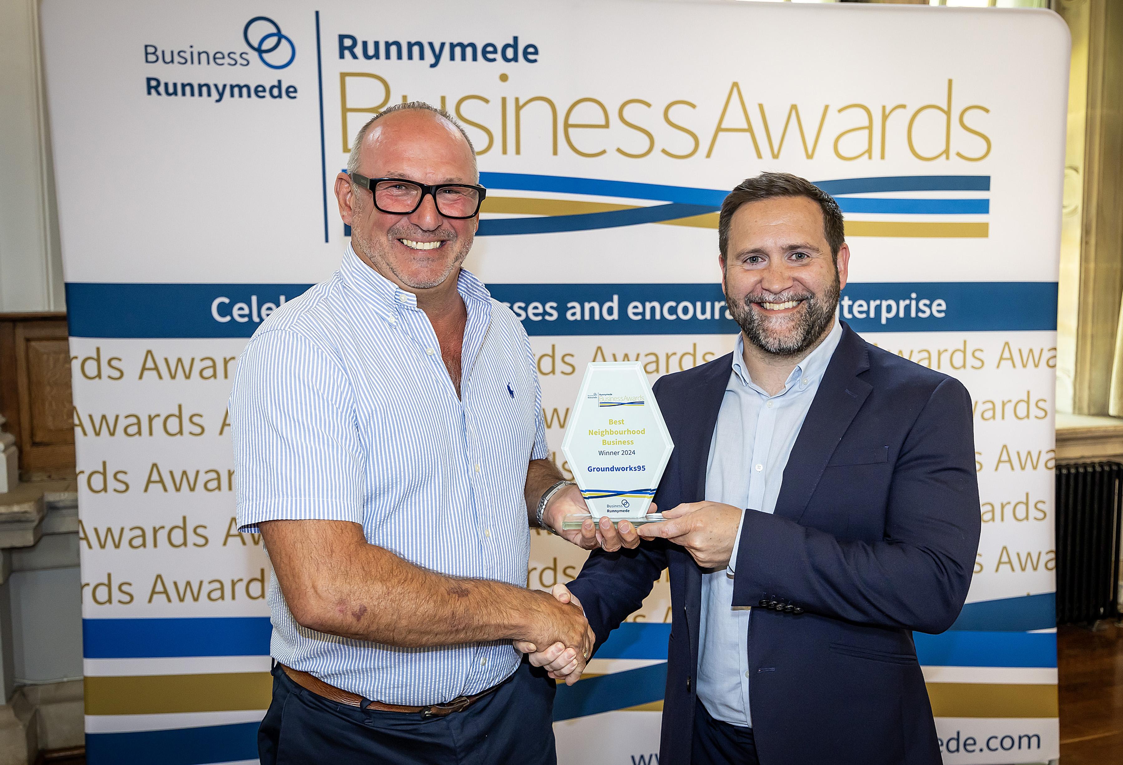 Nathan Wharf from Groundworks95 receives his award.