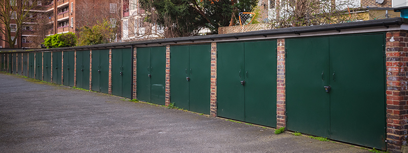 Row of green garage doors