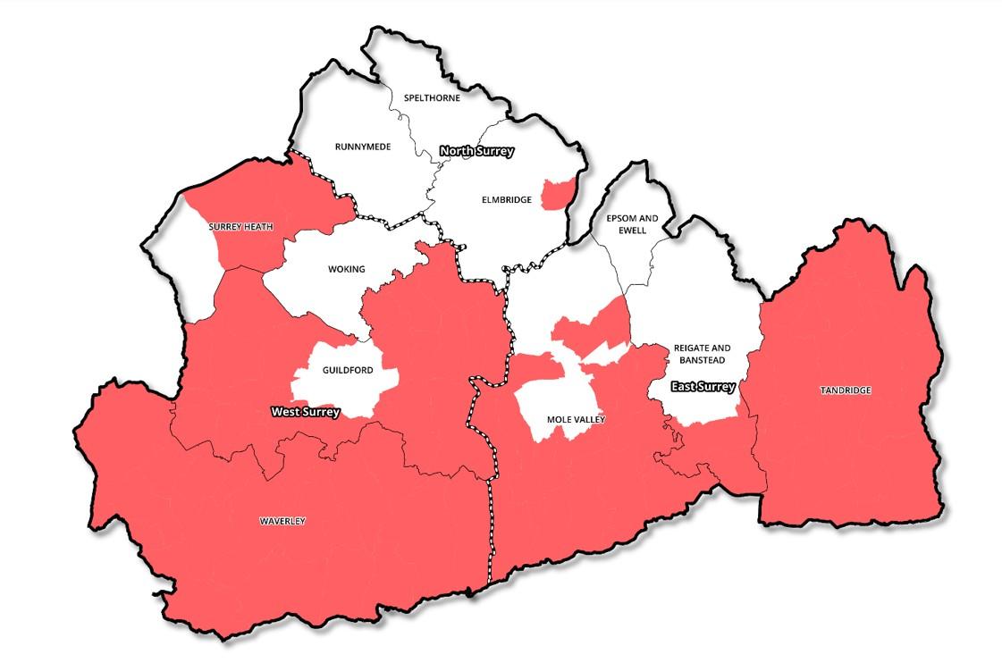 Map denoting parished (red) and unparished (white) areas across Surrey