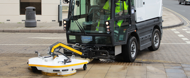 Road sweeper cleaning the streets