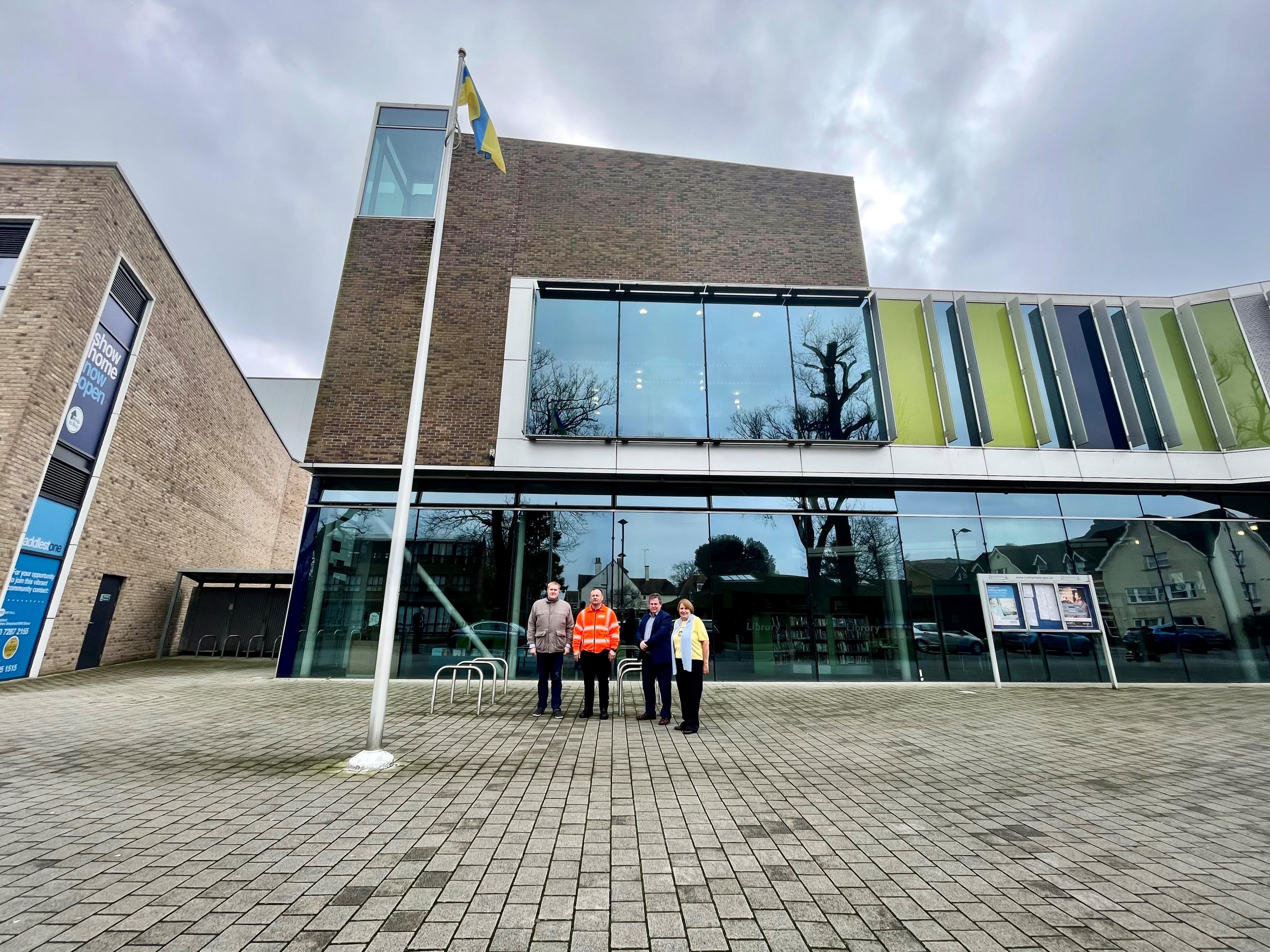 The Mayor of Runnymede and Chief Executive of Runnymede Borough Council raising the Ukrainian flag outside the Civic Centre offices