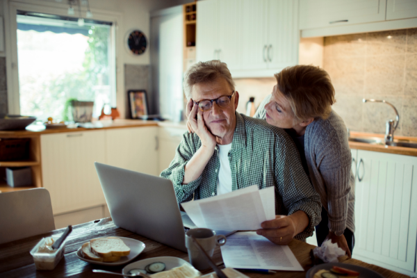 Couple looking at bills