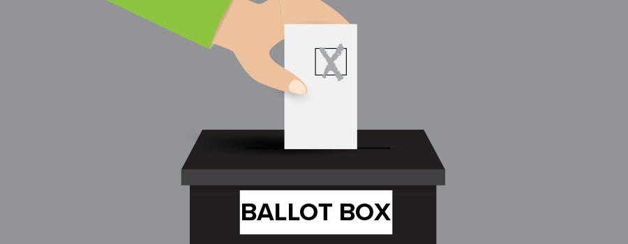 Ballot box with hand posting vote