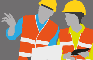 Two people wearing hard hats